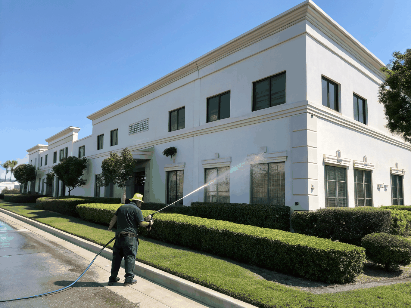 Eco-friendly commercial pressure washing using biodegradable cleaning solutions
